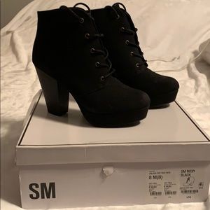 Block heel lace up boots